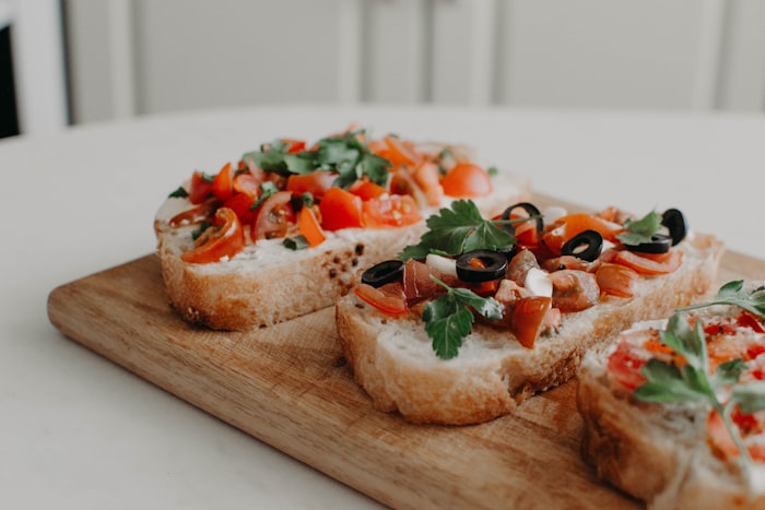 Toasted garlic crostini topped with fresh marinated diced tomatoes and basil