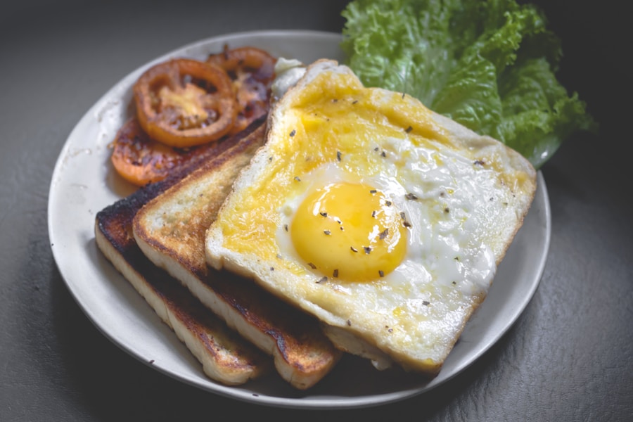 International breakfast spread with eggs, sausage, toast, and fruit