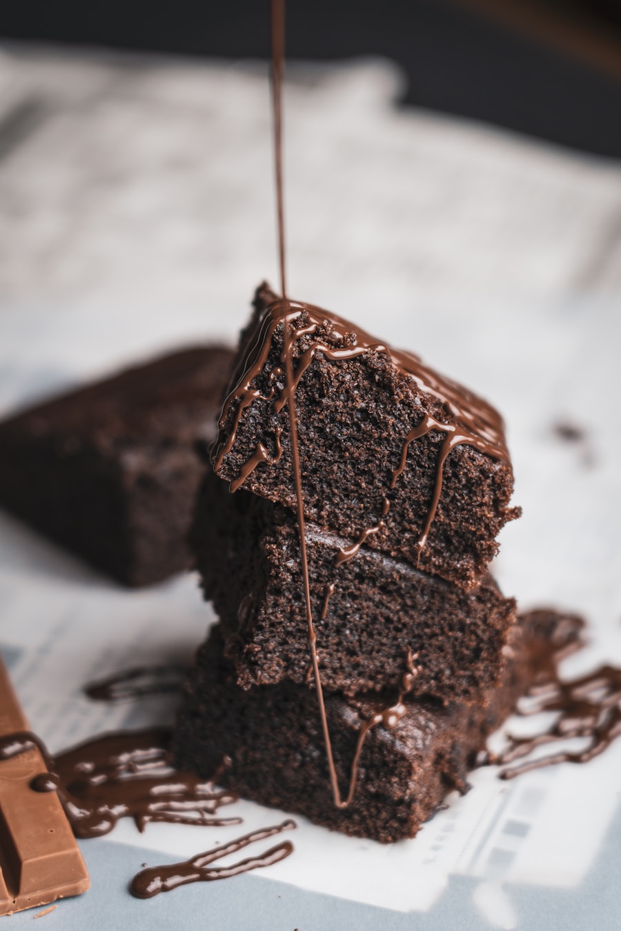Sliced squares of Millionaire shortbread bars displaying crisp cookie base, golden caramel, and chocolate top