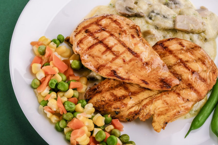 Golden sautΓ©ed chicken cutlets on white platter drizzled with lemon butter caper sauce and parsley