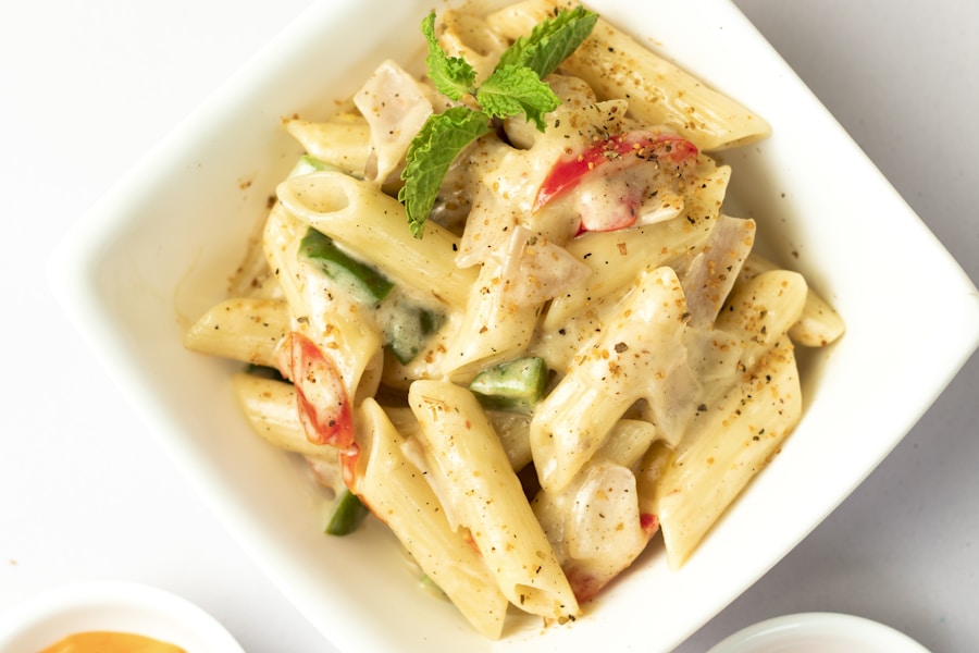 Comforting bowl of Southern macaroni and stewed tomatoes with black pepper