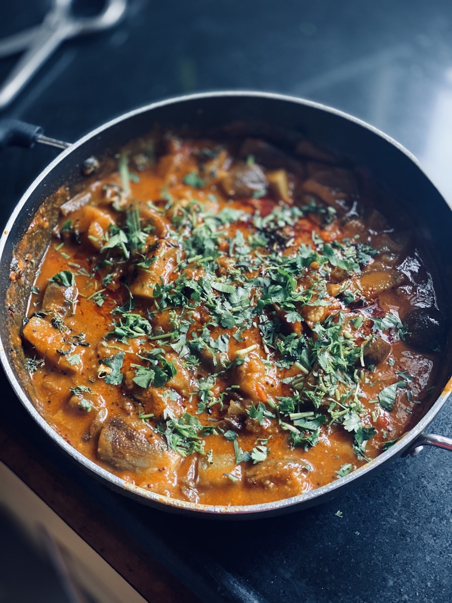 Bubbling Mexican tortilla casserole with melted cheddar, black beans, and sour cream